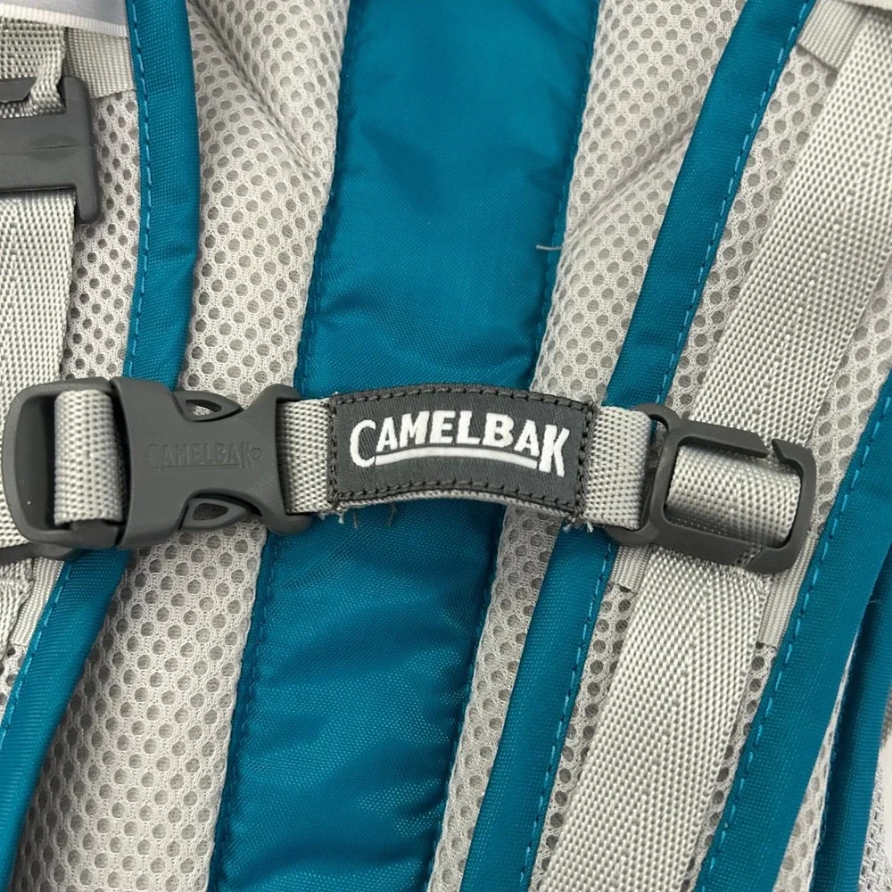 CamelBak Velocity Hydration Pack Teal Blue Reflective Hiking Running Bag 70oz